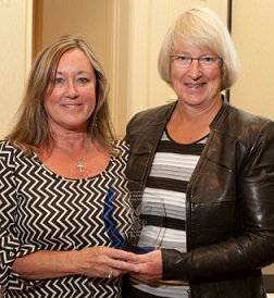 Pat Vos Receiving Award (with Linda Osip) at 2013 CAM-X Convention
